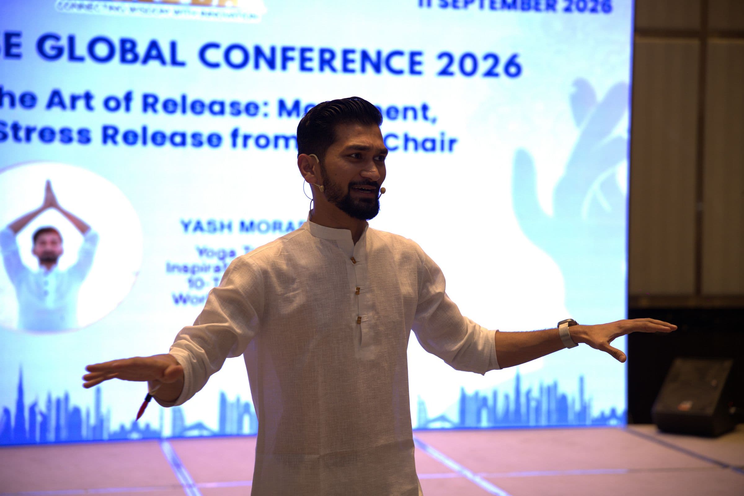 Yash Moradiya leading the chair yoga mobility reset